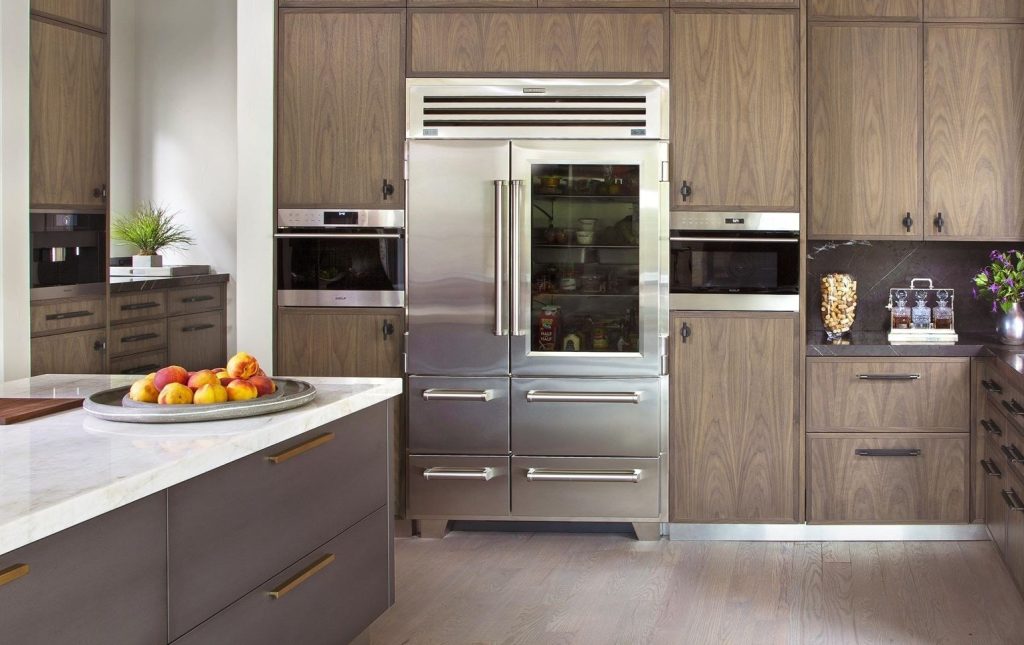 Sub-Zero built-in refrigerator with glass door and freezer drawers