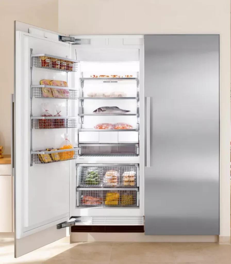 Miele built-in column freezer with open door and frozen food