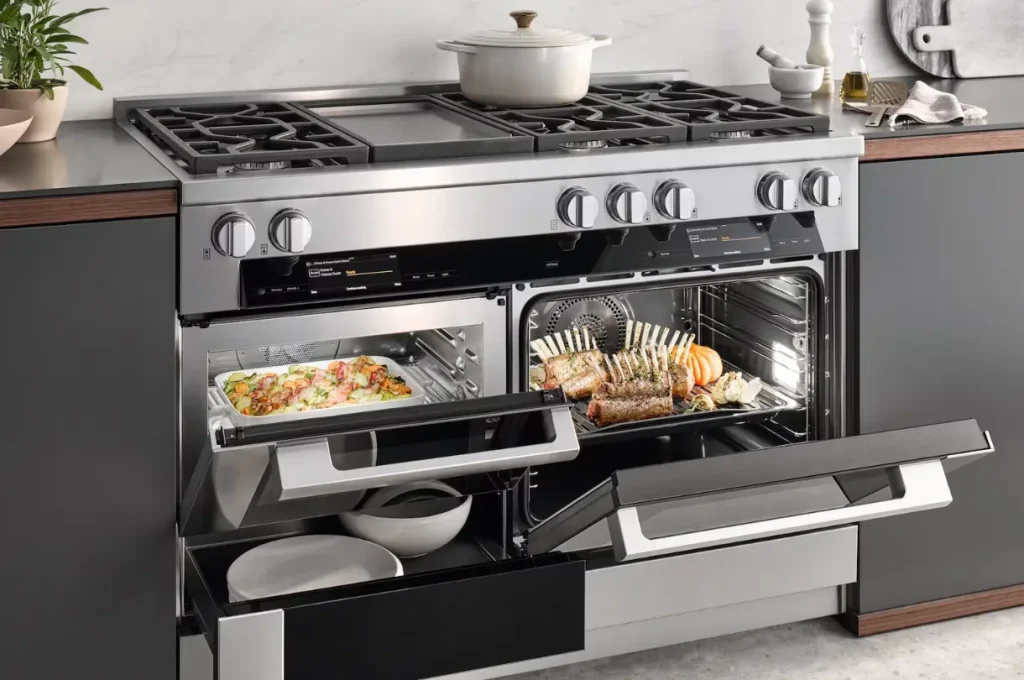 Miele range with open oven and warming drawer