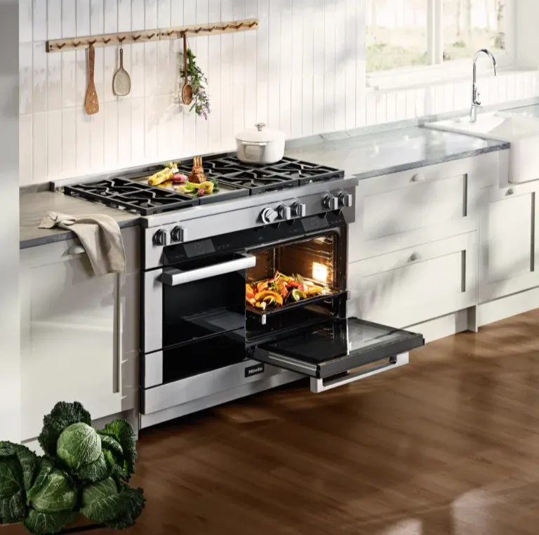 Miele professional stainless steel range with open oven and gas cooktop